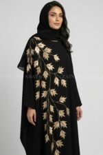 Nida Kaftan Abaya for women in Pakistan with Embroidery and matching scarf in chiffon fabric.