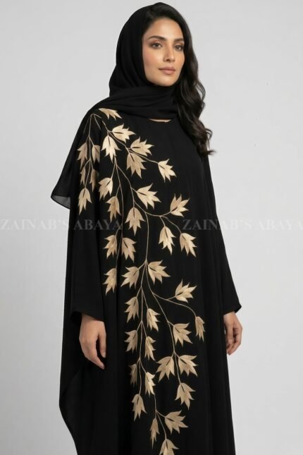 Nida Kaftan Abaya for women in Pakistan with Embroidery and matching scarf in chiffon fabric.