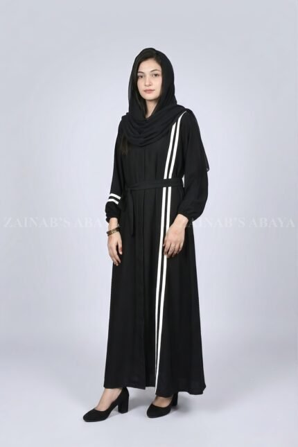 Black modern maxi abaya with an elegant strip design on one side, offering a sleek and stylish look.
