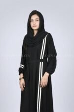 Black modern maxi abaya with an elegant strip design on one side, offering a sleek and stylish look.