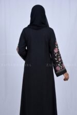 Nida front open abaya with intricate embroidery, offering a stylish and modest design.