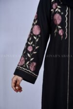 Nida front open abaya with intricate embroidery, offering a stylish and modest design.