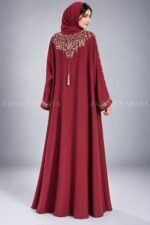 Nida front open gown abaya with intricate embroidery on the front, back, and sleeves, offering a stylish and modest design.